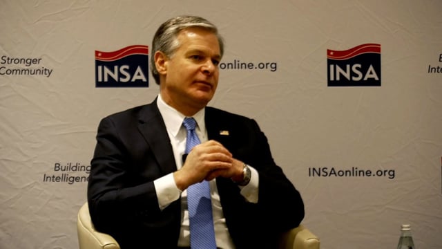 In this screengrab from video, FBI Director Christopher Wray participates in a fireside chat with Sue Gordon, former Principal Deputy Director of National Intelligence, in McClean, Virginia, on Thursday.