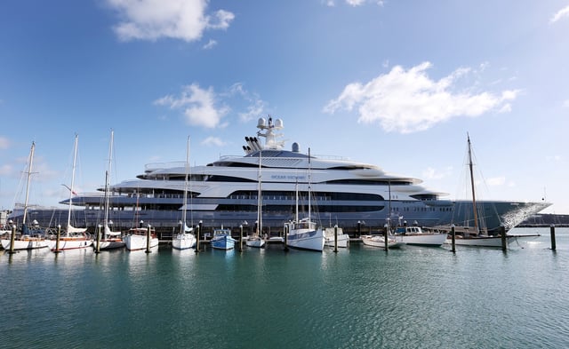 The 140-meter long 'Ocean Victory' is seen docked on July 21, 2015, in Auckland, New Zealand. The superyacht is owned by Russian steel billionaire Viktor Rashnikov and features six swimming pools, a jacuzzi, a gym, a helipad, and a helicopter hanger.