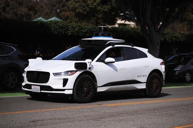 An electric vehicle outfitted with Waymo full self-driving technology in Los Angeles on Feb. 21, 2023. 