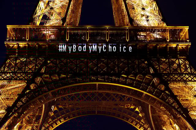 The Eiffel Tower lights up with the message "My body My choice" after French lawmakers enshrined the right to abortion in its constitution during a special congress in Versailles, in Paris, France, March 4, 2024. REUTERS/Abdul Saboor 