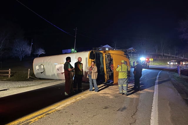 Emergency personnel respond to the scene of a bus crash on Monday, March 4,2024 on West Virginia Route 16 in Calhoun County. The bus driver was arrested Monday for driving under the influence after a crash that sent multiple injured students to the hospital, state police said.(WCHS TV)