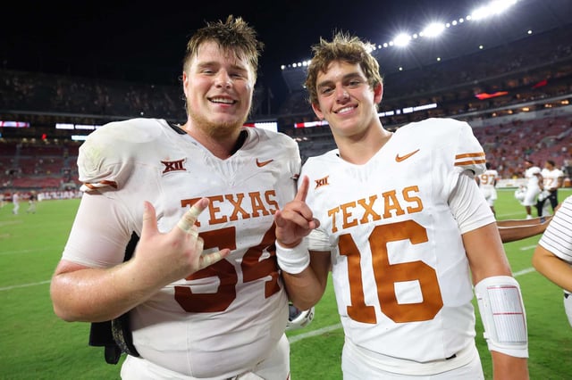 TUSCALOOSA, ALABAMA - SEPTEMBER 09: Cole Hutson #54 and Arch Manning #16 of the Texas Longhorns pose after defeating Alabama Crimson Tide 34-24 at Bryant-Denny Stadium on September 09, 2023 in Tuscaloosa, Alabama.