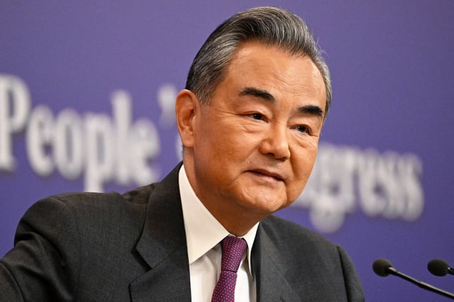 China's Foreign Minister Wang Yi attends a press conference for the Second Session of the 14th National People's Congress (NPC) in Beijing on March 7, 2024.