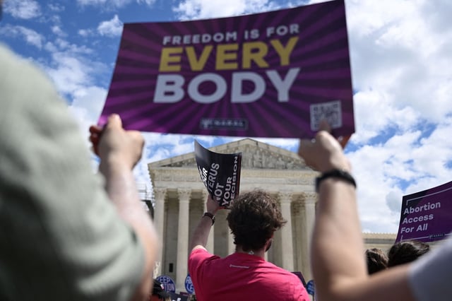 Demonstrators rally in support of abortion rights at the US Supreme Court in Washington, DC, April 15, 2023. - The Court on April 14 temporarily preserved access to mifepristone, a widely used abortion pill, in an 11th-hour ruling preventing lower court restrictions on the drug from coming into force. (Photo by Andrew Caballero-Reynolds / AFP) (Photo by ANDREW CABALLERO-REYNOLDS/AFP via Getty Images)