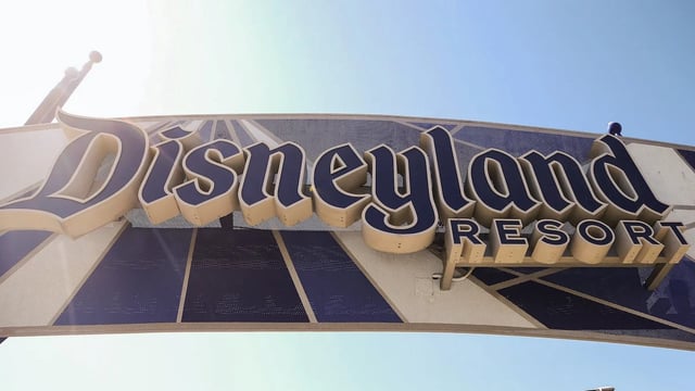 ANAHEIM, CALIFORNIA - SEPTEMBER 30: A sign is posted at an entrance to Disneyland on September 30, 2020 in Anaheim, California. Disney is laying off 28,000 workers amid the toll of the COVID-19 pandemic on theme parks. (Photo by Mario Tama/Getty Images)