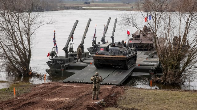 Polish and French forces train together as part of a large-scale NATO joint military exercise, in Korzeniewo, Poland, March 4, 2024 (photo by Dominika Zarzycka for NurPhoto via AP Images).