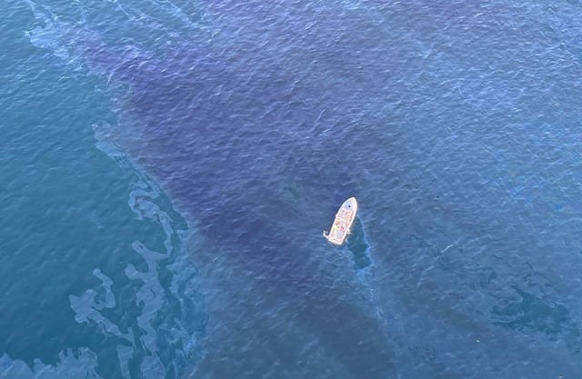 US Coast Guard and local authorities are investigating an oil sheen in the waters off Huntington Beach in Southern California.