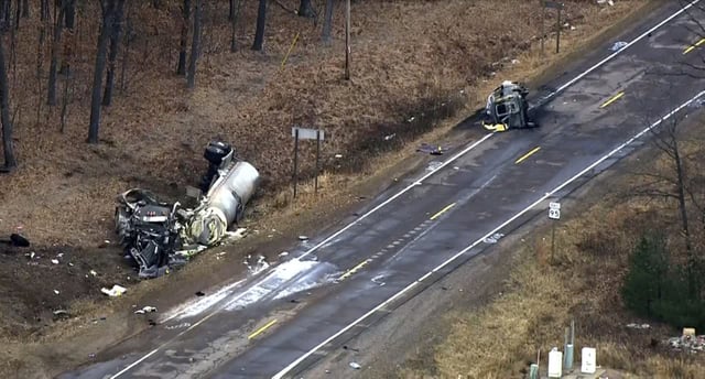This image from video provided by KMSP-TV shows the scene of a fatal crash, Friday, March 8, 2024 in Dewhurst, Wis. Multiple people were killed in a western Wisconsin traffic crash involving a semitruck and a van, state’s governor says. (KMSP-TV via AP)