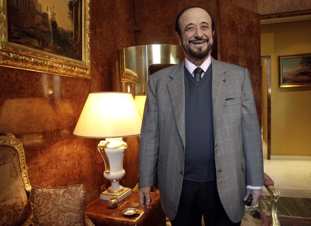 FILE - In this Nov. 15, 2011, file photo, Rifaat Assad poses for a photographer in Paris. Swiss federal prosecutors say they have referred former Syrian Vice President Rifaat Assad, the uncle of the war-battered country's current president, for trial on charges of war crimes and crimes against humanity for allegedly ordering murder and torture more than four decades ago. The attorney general's office said Tuesday, March 12, 2024, that Assad, 86, is accused of ordering the crimes in Syria in February 1982 while serving as commander of defense brigades that carried out an attack in the city of Hama during a conflict between the military and the Islamist opposition.