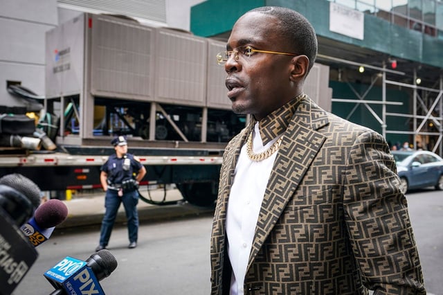 FILE - Bishop Lamor Miller-Whitehead speaks with the media, Tuesday, May 24, 2022, in New York. Miller-Whitehead, a Brooklyn preacher known for his flashy lifestyle and who boasted of his friendship with New York Cityâs mayor, was found guilty in federal court Monday, March 11, 2024, of wire fraud, attempted extortion and lying to the FBI. (AP Photo/Mary Altaffer, File)