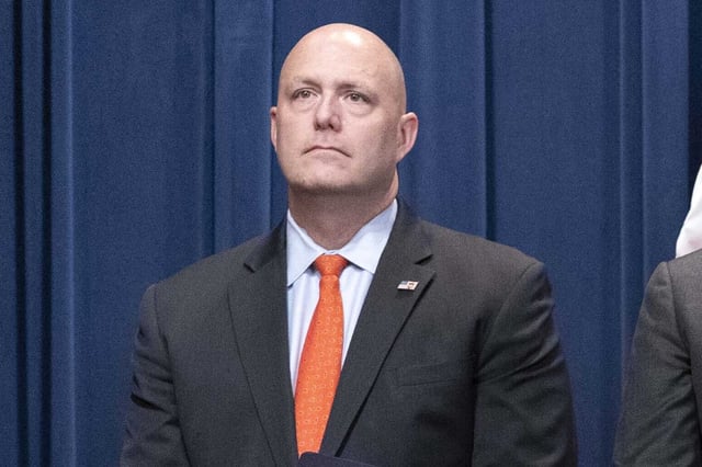 FILE - U.S. Immigration and Customs Enforcement Acting Deputy Director Patrick Lechleitner, listens during a news conference at the Department of Justice in Washington, Sept. 13, 2022. Immigration and Customs Enforcement agents in five cities will start wearing body-worn cameras under a new policy being rolled out. Acting ICE Director Lechleitner said the agency has 1,600 body-worn cameras that will be furnished to agents and officers in Baltimore, Philadelphia, Washington, D.C., Buffalo and Detroit.