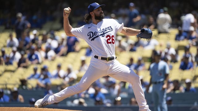 Los Angeles Dodgers starting pitcher Tony Gonsolin (26) delivers a pitch during the first inning of a baseball game against the Toronto Blue Jays in Los Angeles, Wednesday, July 26, 2023. (AP Photo/Kyusung Gong)
