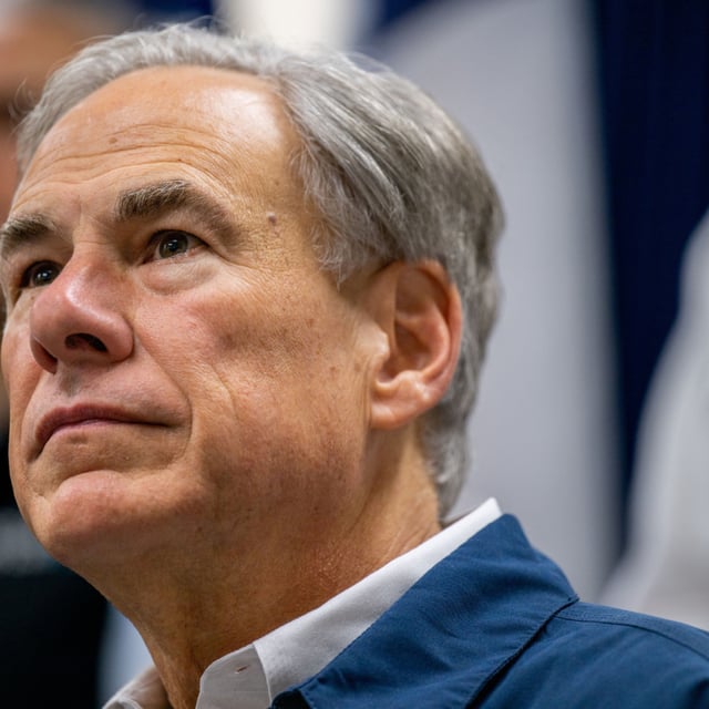 Texas Gov. Greg Abbott listens to reporters during a news conference on January 31, 2023 in Austin, Texas. A number of musicians are holding an unofficial SXSW festival in Texas.