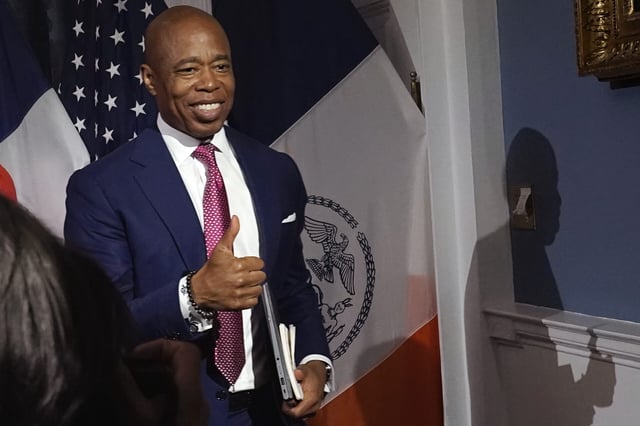 New York Mayor Eric Adams leaves a news conference at New York's City Hall, Tuesday, Nov. 14, 2023.
