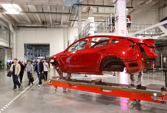 Guests take a tour at the Tesla Giga Texas manufacturing facility in 2022.