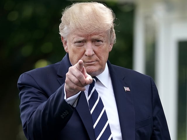 WASHINGTON, DC - JULY 19: U.S. President Donald Trump walks out of the White House before departing July 19, 2019 in Washington, DC. Trump is traveling to New Jersey to host a fundraising dinner and spend the weekend at his Trump National Golf Club in Bedminster. (Photo by Chip Somodevilla/Getty Images)