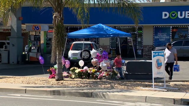 A makeshift memorial is seen at a gas station where a 2-year-old was killed in Woodland, California.