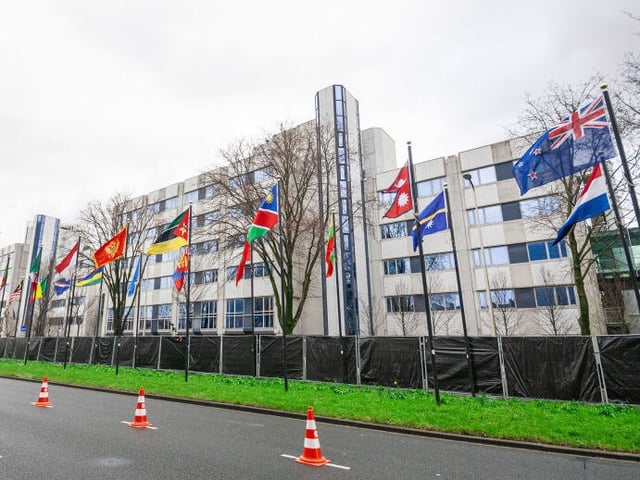 THE HAGUE, SOUTH HOLLAND, NETHERLANDS - 2024/02/09: The flag-lined Johan de Wittlaan in The Hague, home to the new Israeli Embassy, now features a perimeter of black fabric covering the ground floora security measure implemented following the recent discovery of an explosive device in Stockholm, Sweden. The municipality of The Hague, Netherlands, has implemented additional security measures around the perimeter of the Israeli Embassy. Large black screens now obscure the building's ground floor, with police stationed at both the main entrance and sides. Last week in Stockholm, police intercepted an explosive device at the Israeli embassy. Additionally, the Ministry of Defence building in the Netherlands was previously vandalized with red paint. The Netherlands is a supplier of F-35 fighter jet parts to Israel. As the Israeli offensive in Occupied Gaza persists, the death toll has climbed to 27,840, with 67,317 wounded. (Photo by Charles M. Vella/SOPA Images/LightRocket via Getty Images)