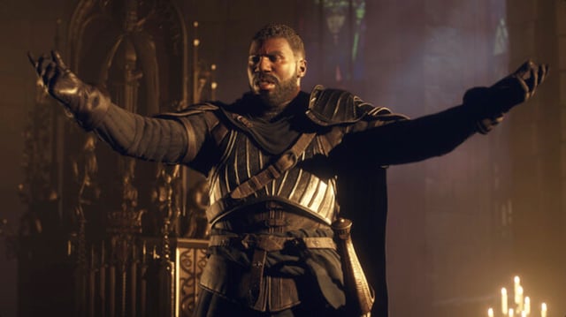 Character standing in a candle lit room with his arms outstretched 