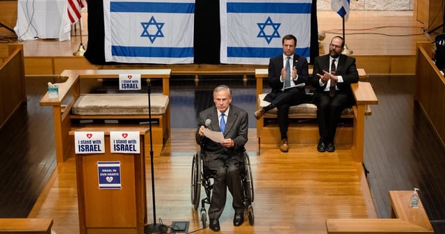 Governor Greg Abbott condemns the recent attacks on Israel during a community gathering in support of Israel at the Congregation Agudas Achim in Austin on Oct. 9, 2023. Abbott also announced efforts for Texas to support Israel, which included funding for increased security at Jewish and Israel-related locations such as synagogues and schools and an Executive Order directing all Texas state agencies to refrain from p…
