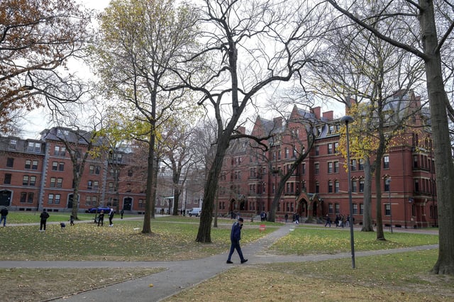 A man walks through Harvard yard at Harvard University in Cambridge, Massachusetts, U.S., December 7, 2023 as leaders of various universities come under fire from their schools' Jewish communities for their handling of clashes between pro-Israel and pro-Palestinian contingents since Hamas' October 7 attack on Israel.  REUTERS/Faith Ninivaggi