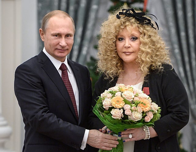Russian President Vladimir Putin, left, and Russian pop singer Alla Pugacheva during an awards ceremony in the Kremlin in Moscow on Dec. 22, 2014.
