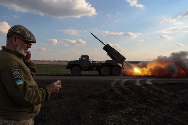 Ukrainian service members fire a BM-21 Grad multiple launch rocket system (MLRS) towards the Russian troops, amid Russia's attack on Ukraine, near a front line in the Donetsk region, Ukraine March 27, 2024. REUTERS/Sofiia Gatilova
