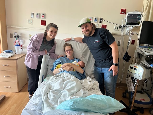 Leah, Alex and dad a day after Bear was born.