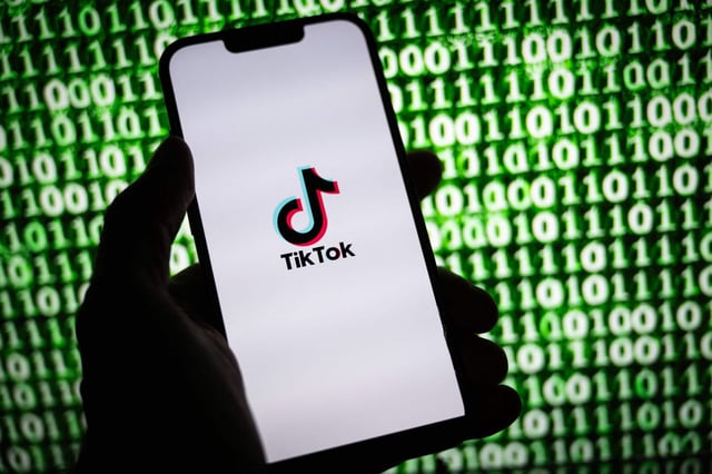 TikTok logo on phone