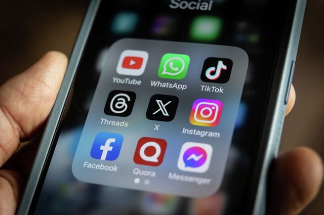 FILE: A folder of social media apps is show on a phone in August, 2023. Instagram, owned by Bay Area-based Meta, was experiencing outages on April 3, 2024