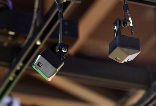 Cameras placed in the ceiling monitor customers as they pick up the items of choice and bill them as they leave the grab-and-go Market Express located in the Hollywood Casino in Detroit. The cashless store uses Amazon's Just Walk Out Technology.