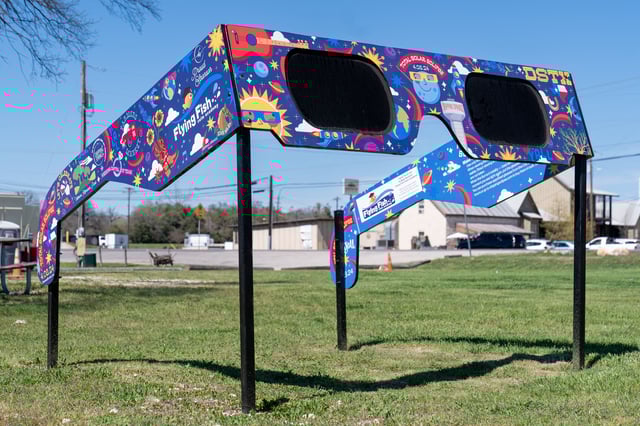 The City of Dripping Springs, Texas is preparing for the solar eclipse with a set of larger than life glasses on display at Veterans Memorial Park on March 5, 2024. Millions of people across the United States are preparing to watch April's total solar eclipse.