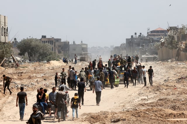 Palestinians who had taken refuge in Rafah, leave the city to return to Khan Yunis after Israel pulled its ground forces out of the southern Gaza Strip, on April 7, 2024, six months into the devastating war sparked by the October 7 attacks. Israel pulled all its troops out of southern Gaza on April 7, including from the city of Khan Yunis, the military and Israeli media said, after months of fierce fighting with Hamas militants left the area devastated.