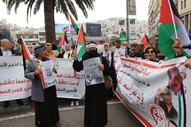 Mandatory Credit: Photo by ALAA BADARNEH/EPA-EFE/Shutterstock (14423970f)
People protest following the death in an Israeli jail of terminally ill Palestinian activist and novelist Walid Daqqa, in the West Bank City of Nablus, 08 April 2024. Walid Daqqa, who spent 39 years in Israeli prisons and had cancer, died on 07 April 2024 in the Israeli Assaf Harofeh Hospital following "years of deliberate medical negligence by the Israeli prison administration", according to a statement by the Detainees and Ex-Detainees' Affairs Commission and the Palestinian Prisoner's Society (PPS).
Protest in Nablus following death of terminally ill Palestinian novelist jailed for 39 years - 08 Apr 2024