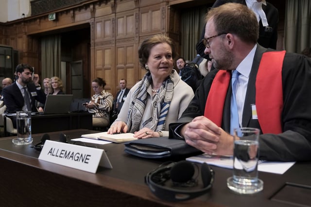Tania von Uslar-Gleichen, Germany's legal adviser and Director-General for Legal Affairs of the German Foreign Ministry, left, and the member of Germany's legal team, Christian J. Tams, wait for the start of a two days hearing at the World Court in The Hague, Netherlands, Monday, April 8, 2024, in a case brought by Nicaragua accusing Germany of breaching the genocide convention by providing arms and support to Israel. (AP Photo/Patrick Post)