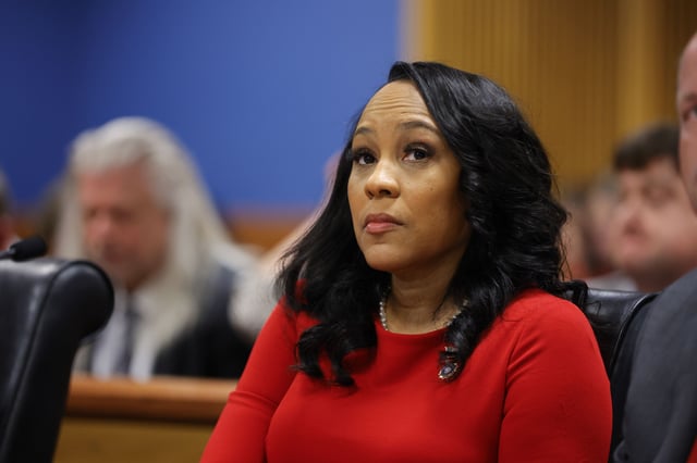 Fani Willis Department of Justice inconsistencies