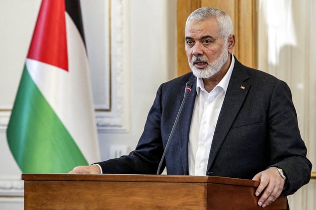 Ismail Haniyeh speaks to the press