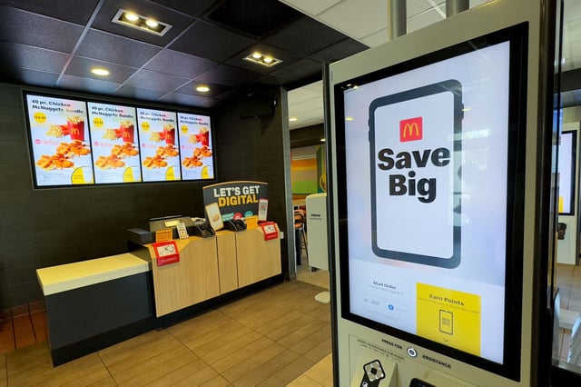 An automated screen to select and order your food is shown at a McDonald's restaurant, as California begins a new wage law that applies to fast-food chains with at least 60 locations nationwide to increase their minimum wage to $20 an hour for fast-food workers, in Del Mar, California, U.S., April 1, 2024.