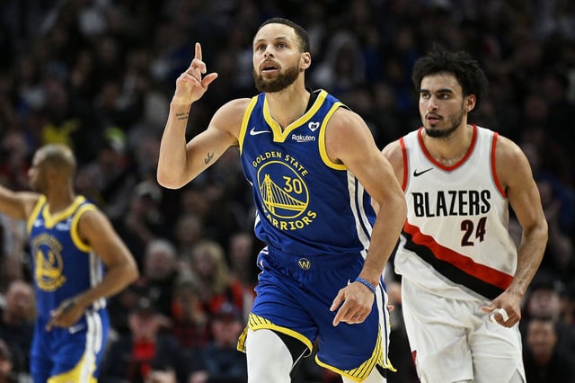 Apr 11, 2024; Portland, Oregon, USA; Golden State Warriors guard Stephen Curry (30) celebrates after a three point basket during the second half against Portland Trail Blazers forward Justin Minaya (24) at Moda Center. Mandatory Credit: Troy Wayrynen-USA TODAY Sports