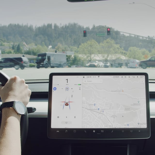 Stopping at stop signs and traffic lights is one of the features you get with FSD beta. 
