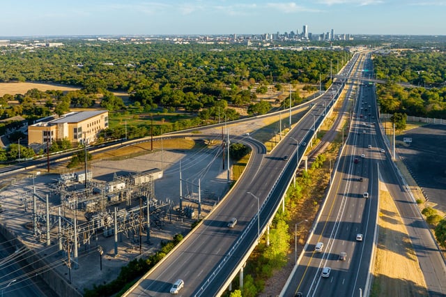 Texas Electric Grid Under Strain As Triple-Digit Temperatures Continue. An aerial view of a power plant next to a freeway overpass on August 18, 2023 in Austin, Texas. The Electric Reliability Council of Texas (ERCOT) has asked Texans to conserve power as a prolonged heat wave continues sweeping across the state. Today marks 42 consecutive days of triple digit weather across the state.