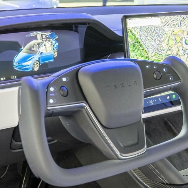 This car can sorta drive itself, but not really. The option that enables that is now a lot cheaper, though. 
