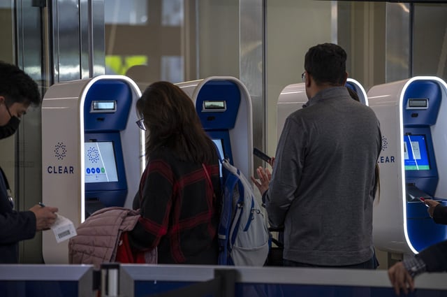 Travelers use Clear Plus kiosks at San Francisco International Airport (SFO) in San Francisco, California, US, on Wednesday, Nov. 22, 2023.