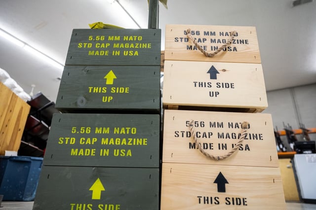 Crates containing shipments of rifle magazines at Knob Creek Gun Range in West Point, Ky., in 2021.