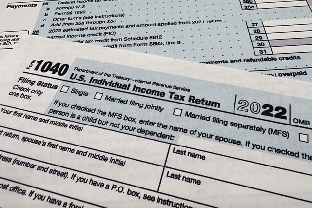 The Internal Revenue Service 1040 tax form for 2022 is seen on April 17, 2023. The IRS said Friday, April 26, 2024, more than 140,000 taxpayers filed their taxes through its new direct file pilot program. It says the program's users claimed more than $90 million in refunds, saving roughly $5.6 million in fees they would have spent with commercial tax preparation companies. (AP Photo/Jon Elswick, File)