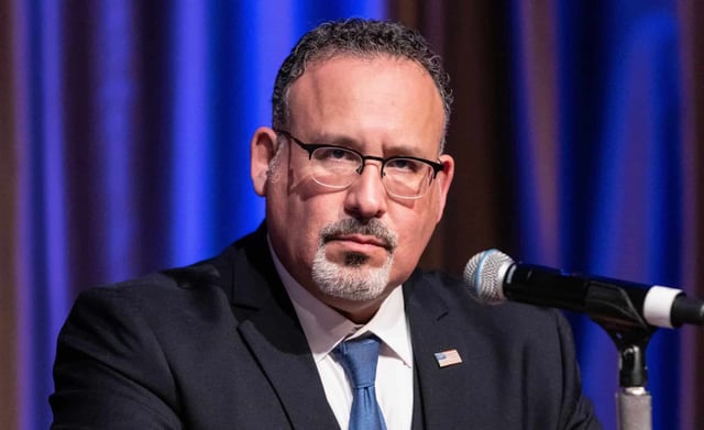 Secretary Miguel Cardona speaks in New York City, April 12, 2023 (Lev Radin/Shutterstock)
