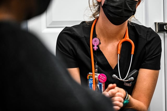 A woman, who chose to remain anonymous, has her vitals checked before receiving an abortion at a Planned Parenthood Abortion Clinic in Jacksonville, Florida on July 20, 2022. Planned Parenthood clinics in Florida have opened their doors on weekends and extended their working hours, with 12-hour days in some clinics, to handle the influx of out-of-state patients, most of them from Georgia, Alabama or Texas. While Florida has reduced its window for abortions to the 15th week of pregnancy -- it was previously the 24th week -- the state's laws are still among the most permissive in the southeast United States. Other Republican-led states in the area -- including Louisiana, Mississippi, Alabama and Georgia -- have almost completely banned the practice or reduced the window to six weeks, seizing on the Supreme Court's stunning reversal of the nationwide right to abortion.