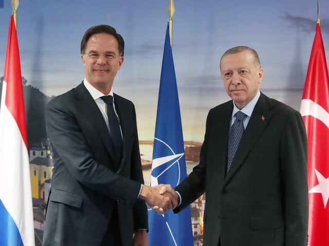 MADRID, SPAIN - JUNE 30: (----EDITORIAL USE ONLY â MANDATORY CREDIT - "TURKISH PRESIDENCY / MURAT CETINMUHURDAR / HANDOUT" - NO MARKETING NO ADVERTISING CAMPAIGNS - DISTRIBUTED AS A SERVICE TO CLIENTS----) Turkish President Recep Tayyip Erdogan (R) meets with Dutch Prime Minister Mark Rutte (L) as part of the NATO Heads of State and Government Summit at the IFEMA Congress Center in Madrid, Spain on June 30, 2022. (Photo by TUR Presidency/ Murat Cetinmuhurdar / Handout/Anadolu Agency via Getty Images)
