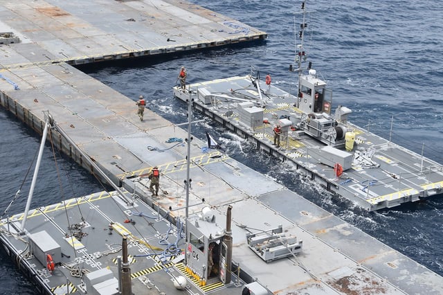 The under construction floating JLOTS pier is pictured off the coast of Gaza. The US military began the construction of the temporary pier intended to help deliver humanitarian aid to Gaza.