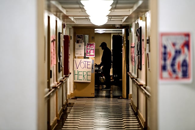 Voters arrive to cast their ballots at the Kendell Arms polling location on Nov. 8, 2022 in Philadelphia.
